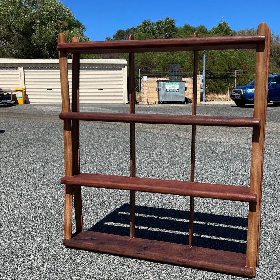 Finished four-tier jarrah shelf unit, sanded and oiled
